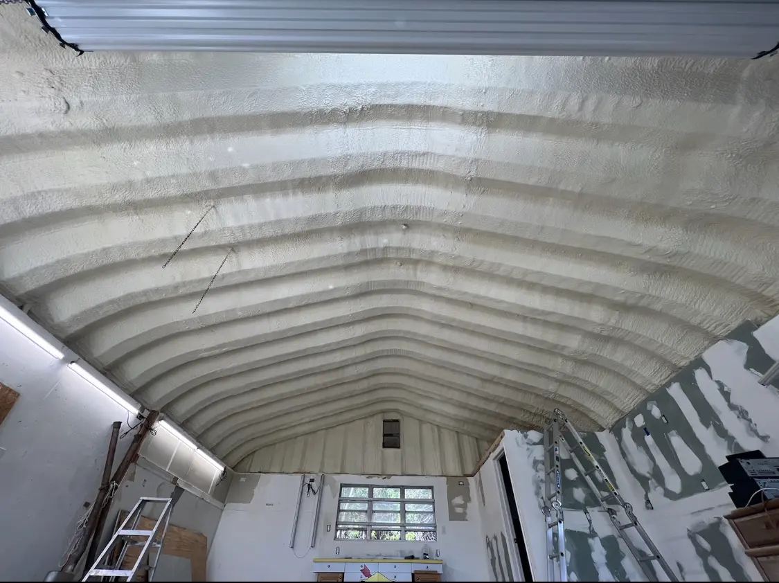 Spray polyurethane foam applied to the underside of a metal roof deck in Camp Pendleton South